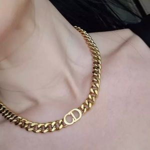 Designer Inspired! Gold CD Choker Necklace.